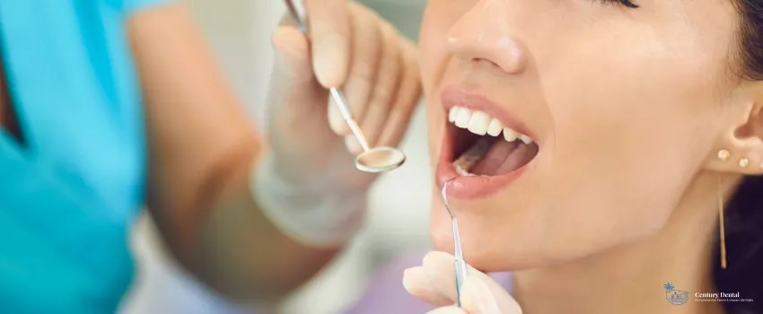 CD - Woman getting her teeth checked by a dentist