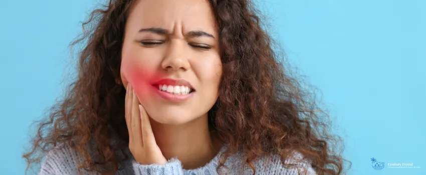 CD - Woman suffering from tooth pain