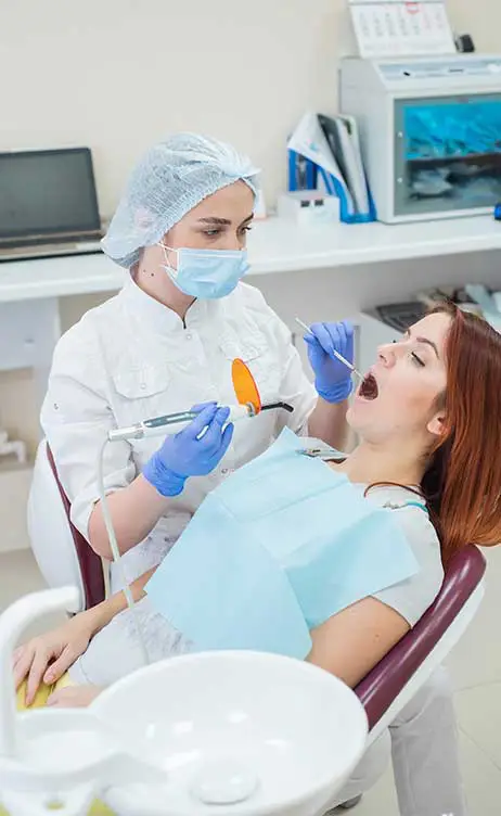 CD Adding dental fillings to patient